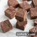 overhead photo of a stack of fudge with more fudge squares around it