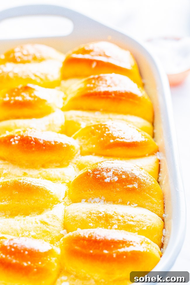 Classic Green Bean Casserole Recipe for Holiday Dinner 26 Parker House Rolls in a baking dish.