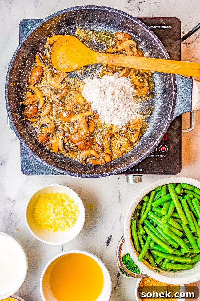 Classic Green Bean Casserole Recipe for Holiday Dinner 6 Process shot of onions being sautéed in a skillet.