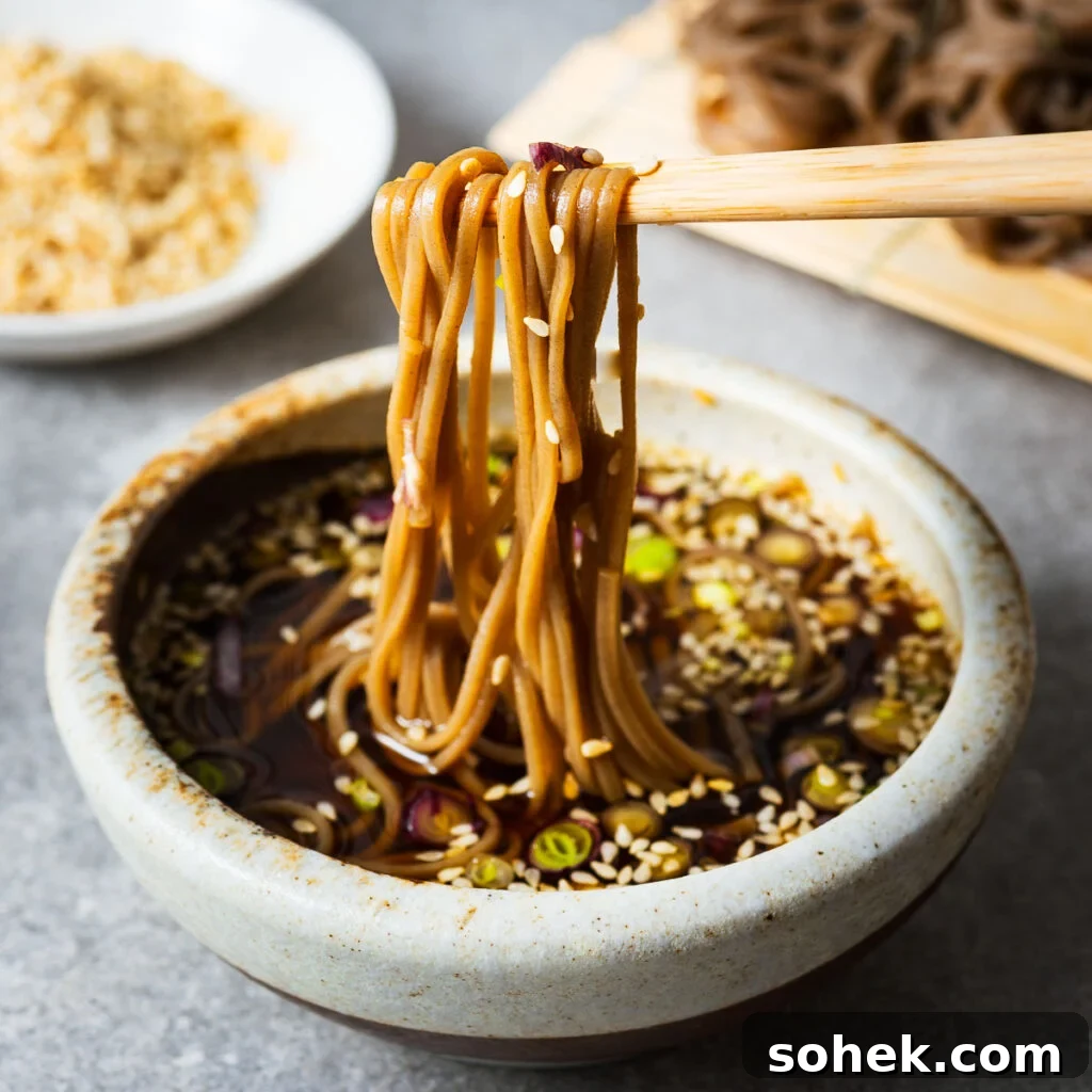 Spicy Thai Green Mango Salad (Yam Ma Muang) — Tangy Mango Thai Salad 14 Soba noodles dipped into Japanese mentsuyu dipping sauce with chopsticks.