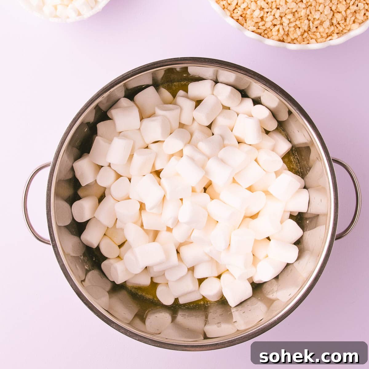 Gluten-Free Rice Krispie Treats Recipe — Crispy & Chewy Bars 6 The marshmallows added to the pan.
