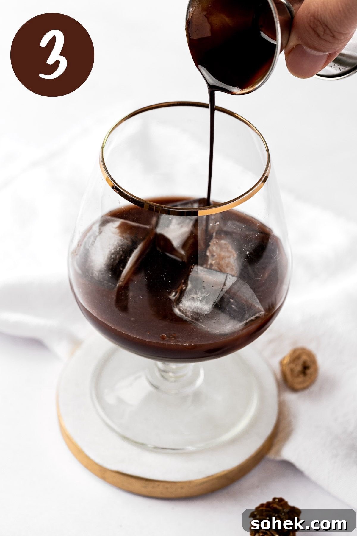 Chocolate Old Fashioned Cocktail Recipe & How to Make It 6 A process photo illustrating step 3.