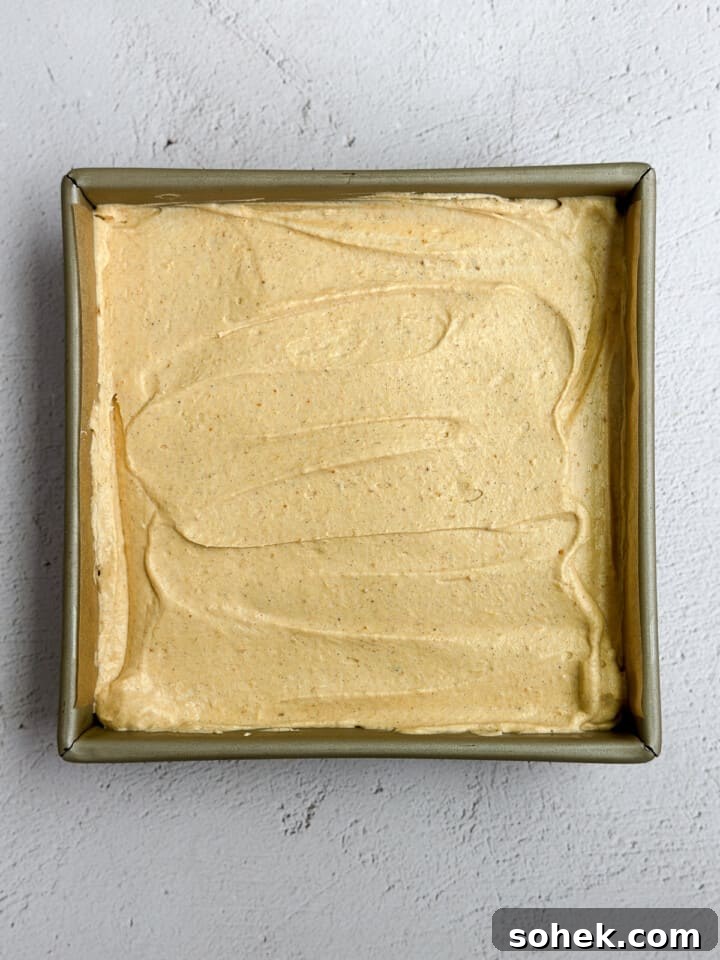 No-Bake Pumpkin Cheesecake Bars — Creamy Fall Dessert Recipe 11 cheesecake in the pan.