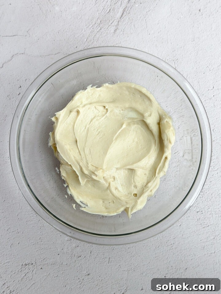 No-Bake Pumpkin Cheesecake Bars — Creamy Fall Dessert Recipe 7 cream cheese and sugars mixed.
