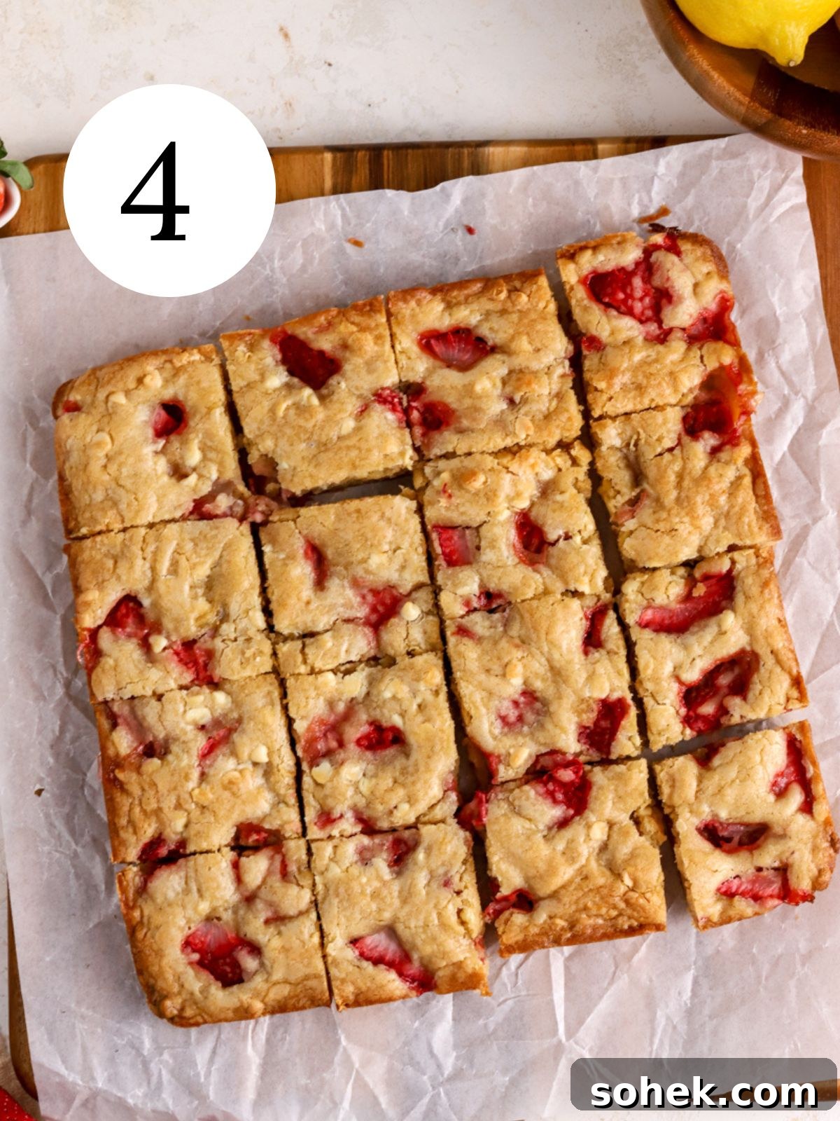 Baked strawberry blondies cooling in pan