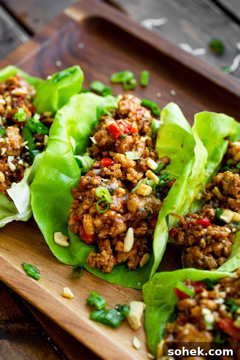 Weekly Meal Plan: October 2–8 (7-Day Menu Guide) 5 a photo of turkey lettuce wraps in bright green butter lettuce leaves.