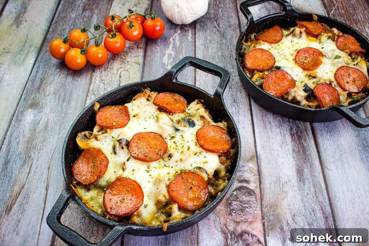 21 Quick Ground Beef Dinners That Will Have Everyone Asking Your Secret 22 Pizza Casserole in two serving dishes.