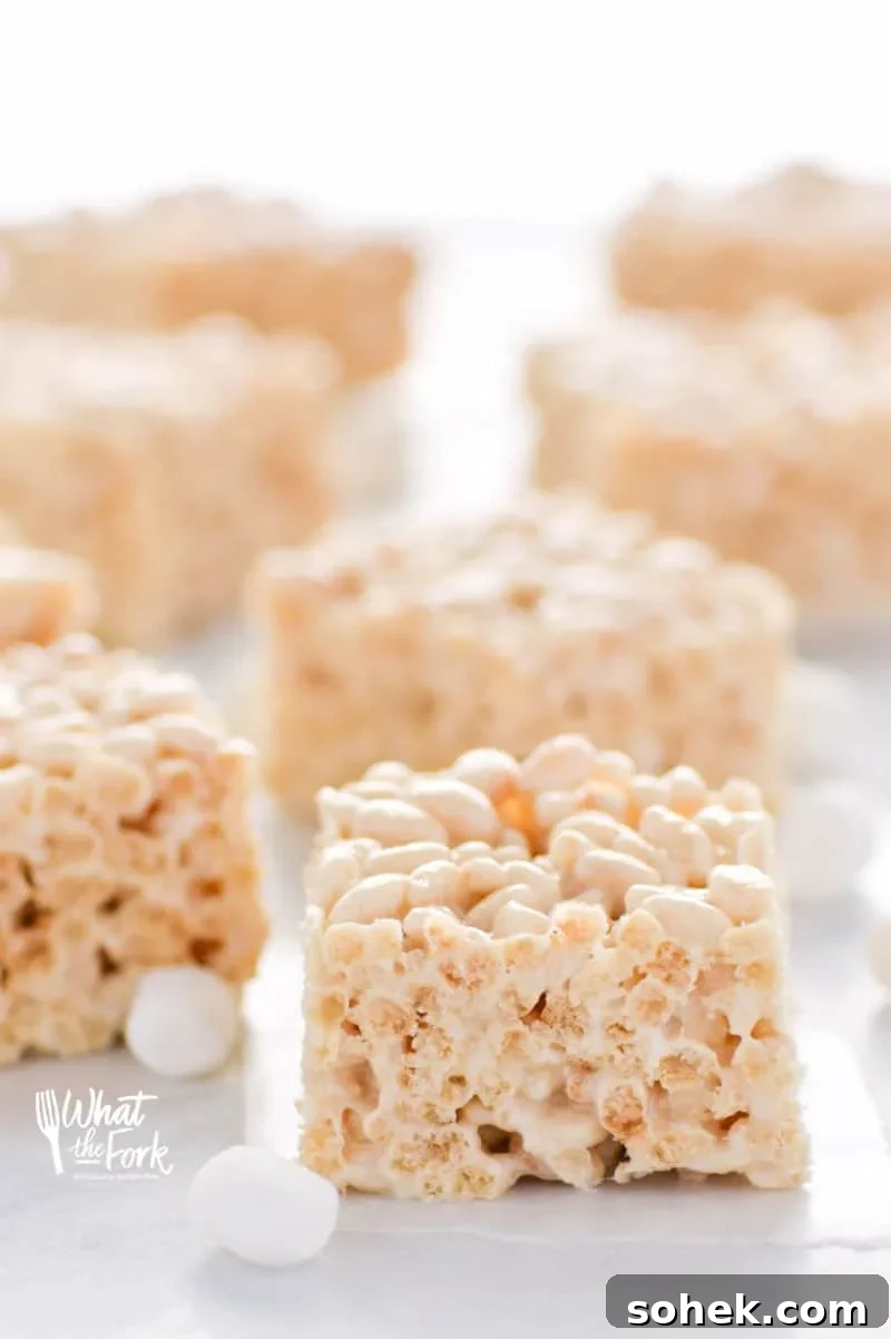 Classic Gluten-Free Rice Krispies Treats Recipe for Crispy Marshmallow Bars 4 Up close hero shot of recipe for gluten free rice krispies treats