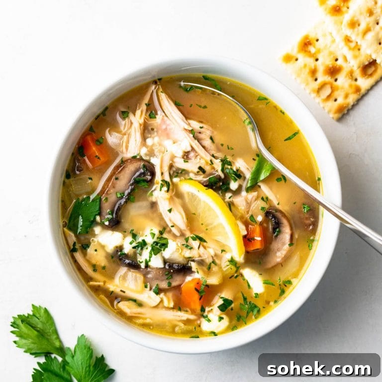 Lemon chicken greek soup in a bowl.