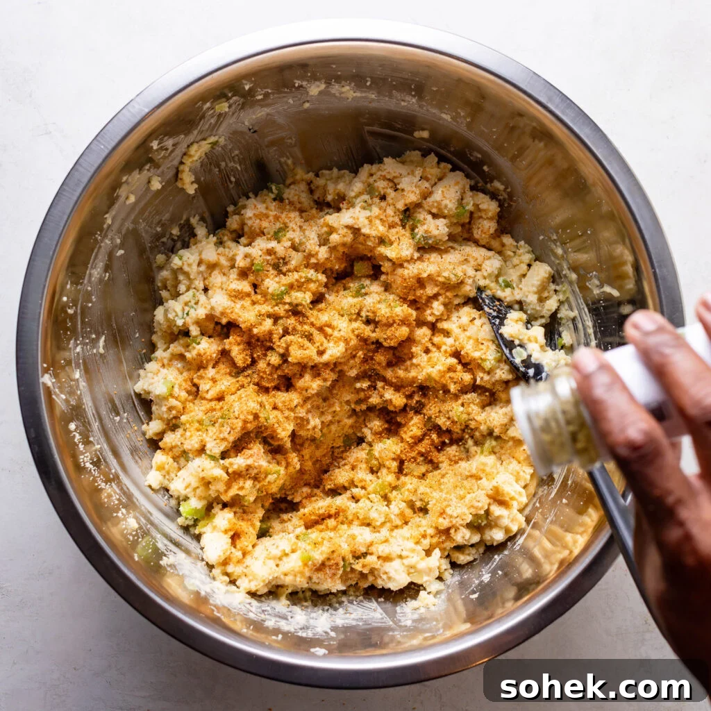 seasoning the chicken and cornbread dressing with salt, granulated garlic and onion, dried sage, and poultry seasoning.  