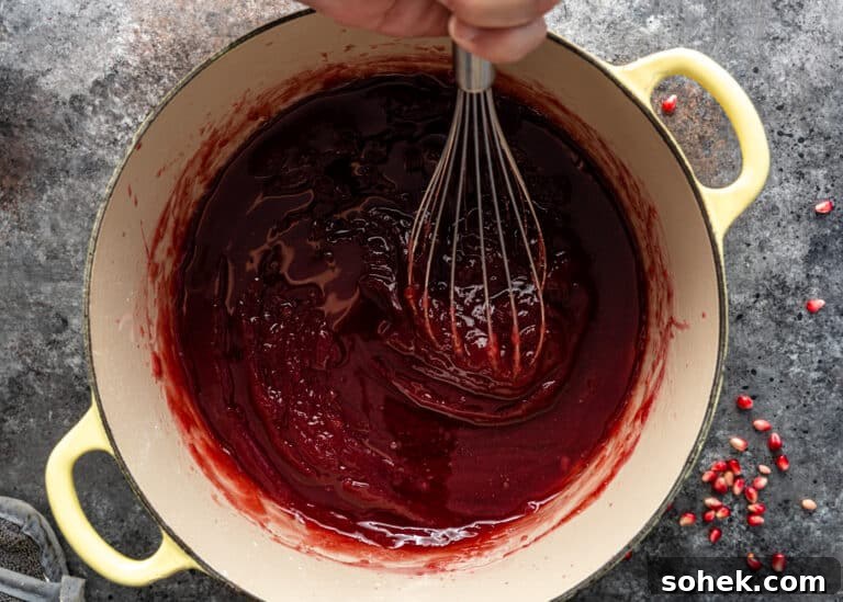 Authentic Turkish Delight (Lokum) Recipe for Soft, Chewy Sweets 12 whisking pomegranate juice into pot of sugar syrup for lokum candies