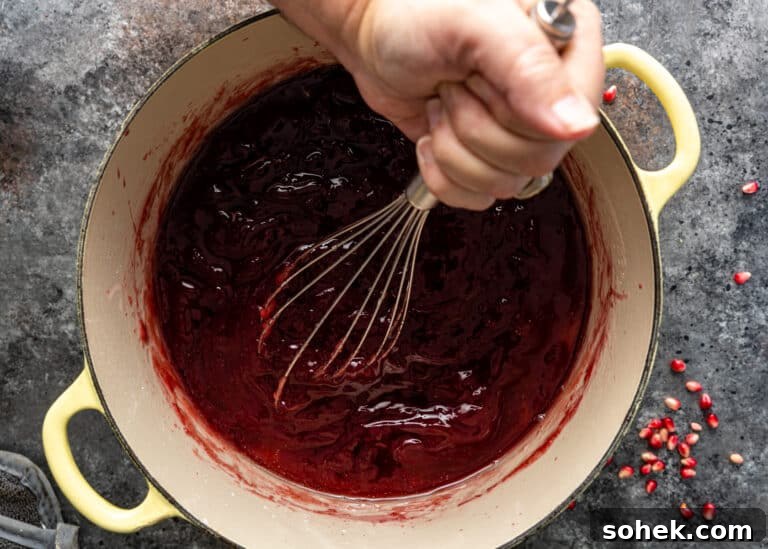 Authentic Turkish Delight (Lokum) Recipe for Soft, Chewy Sweets 13 whisking pomegranate syrup in large pot for locum recipe