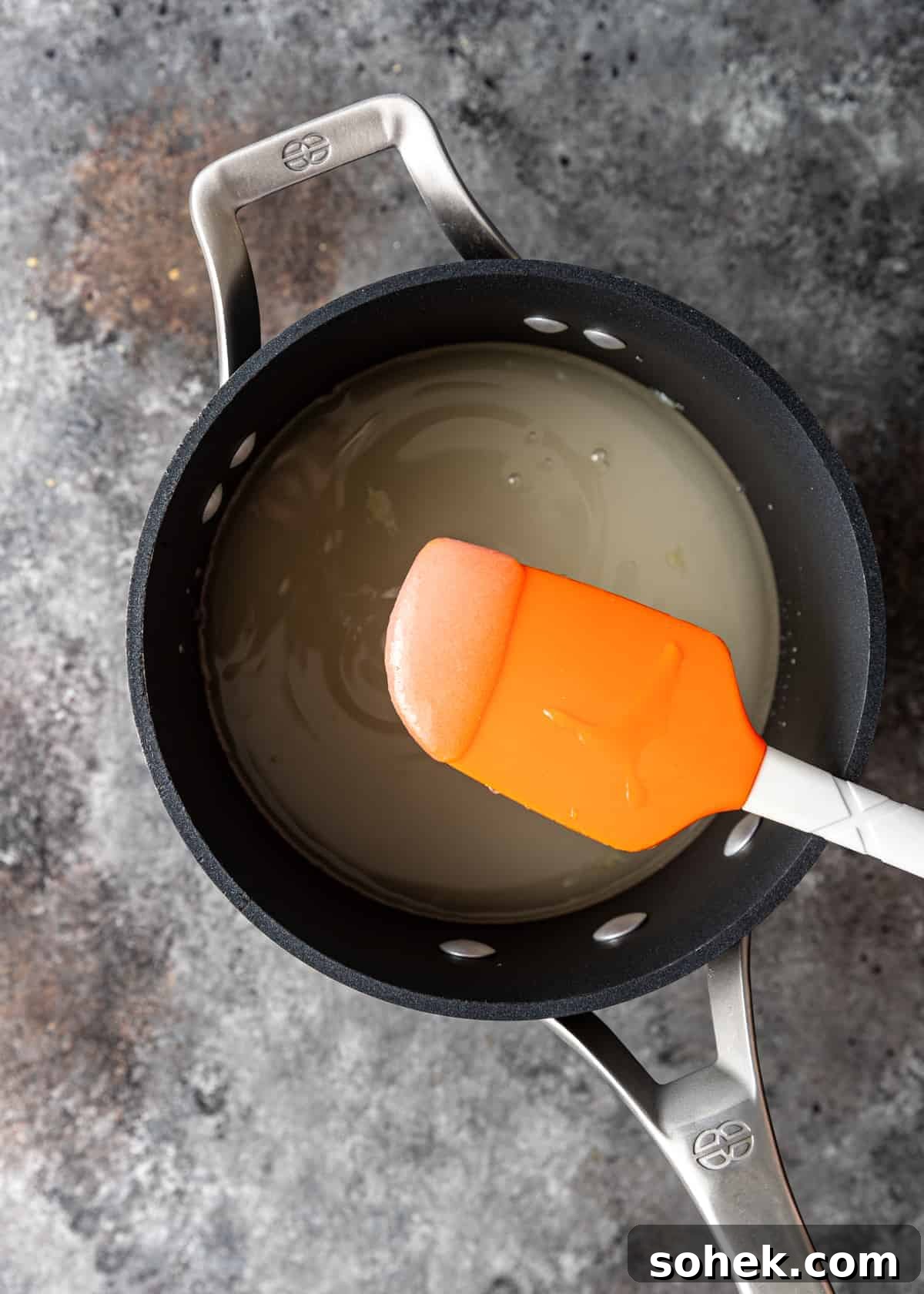 Authentic Turkish Delight (Lokum) Recipe for Soft, Chewy Sweets 5 sugar melting with water in saucepan