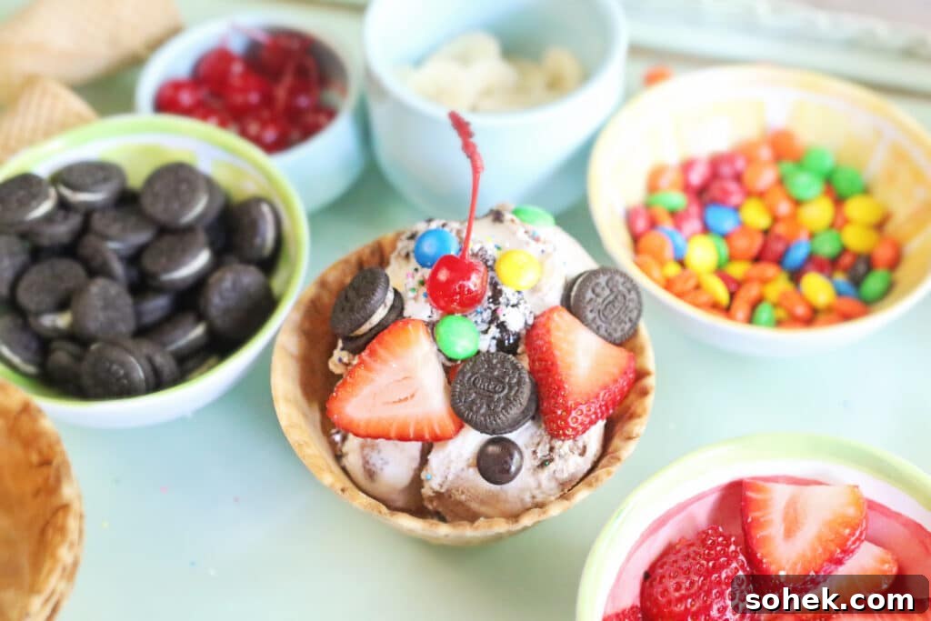 DIY Ice Cream Sundae Bar Ideas for Parties and Gatherings 7 A waffle bowl filled with scoops of ice cream and surrounded by bowls of sundae toppings.