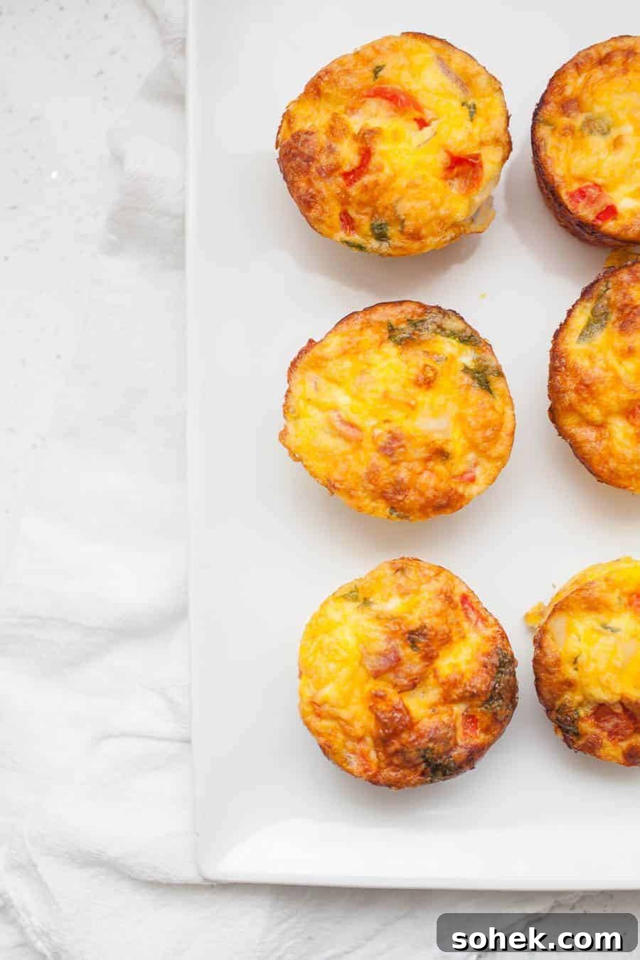 Simplify your breakfast routine with Make Ahead Breakfast Frittata Muffins. With this delicious recipe, you'll have breakfast prepped for the week. These frittata muffins are packed with flavor and you can even customize them to use up the vegetables you have on hand.