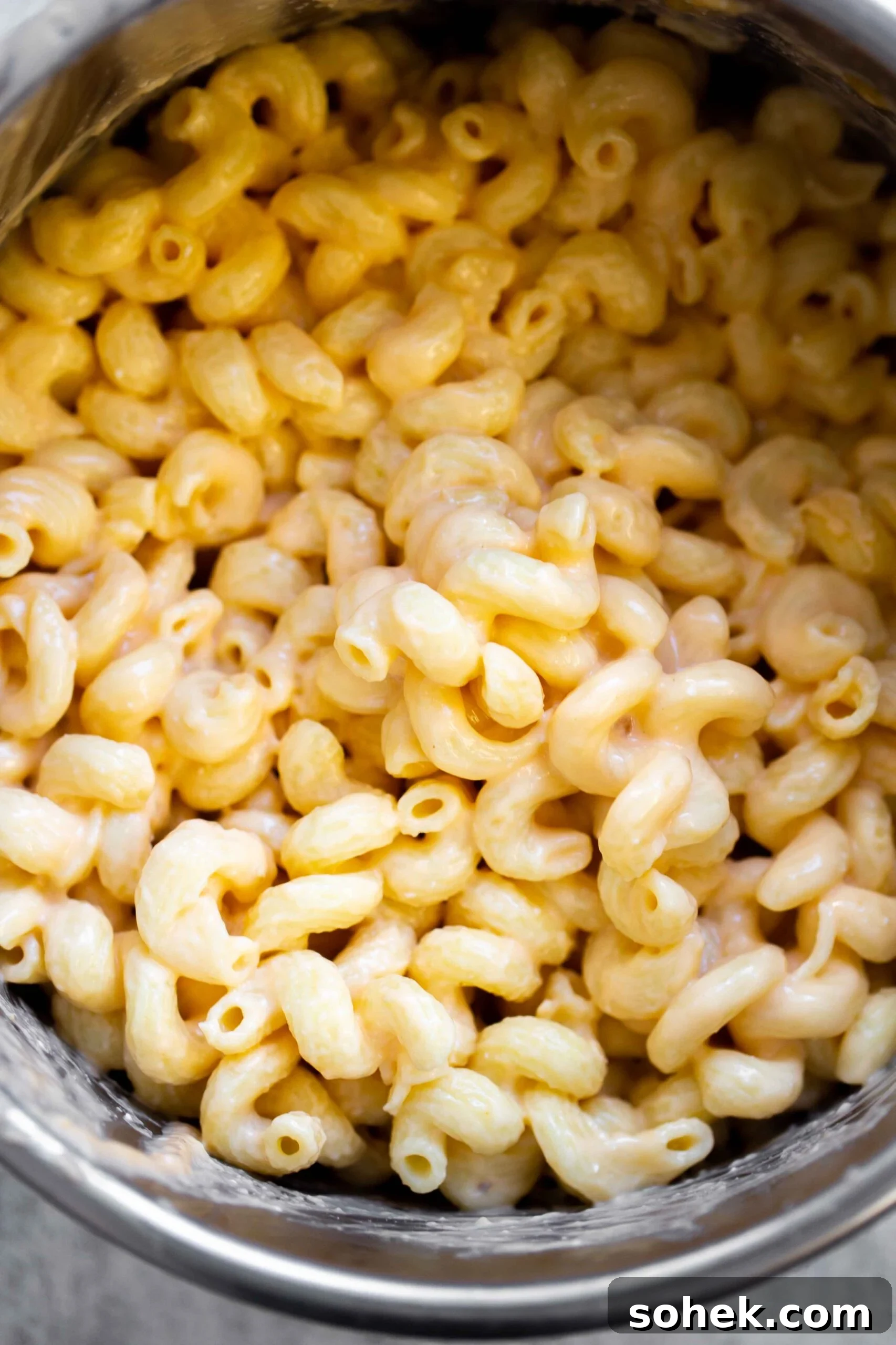overhead photo of a creamy instant pot mac and cheese recipe in the instant pot