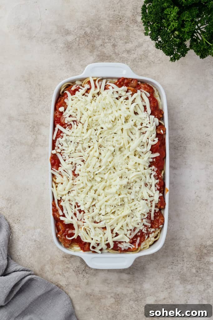 A layered, unbaked spaghetti casserole.