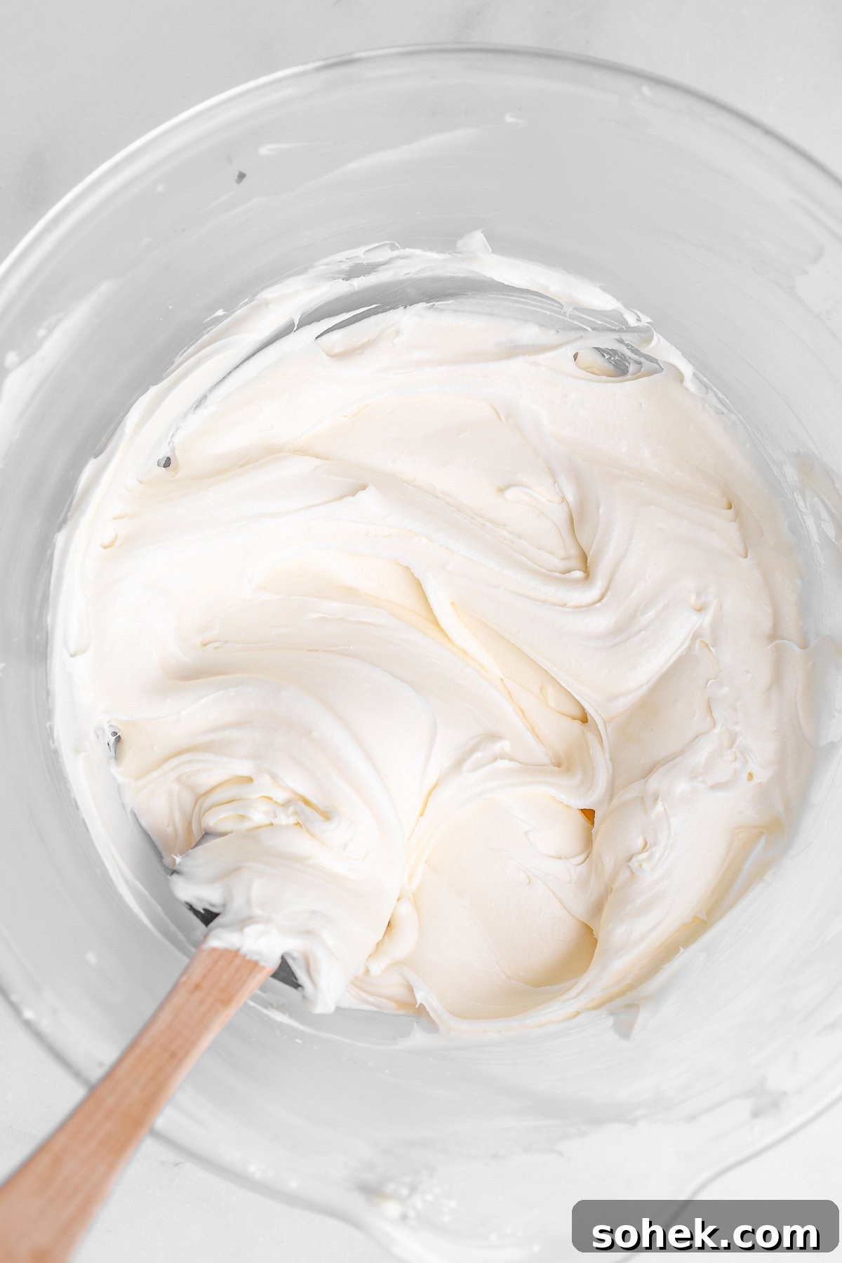 cream cheese frosting in a mixing bowl