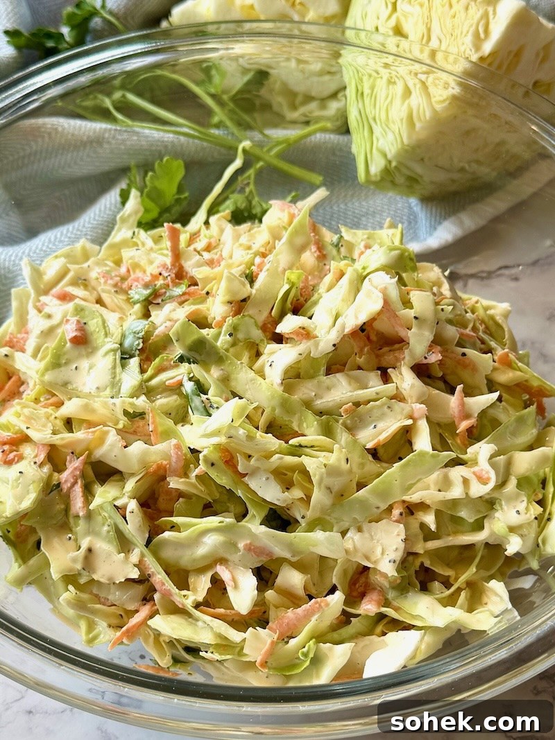 Coleslaw mixed with the dressing. 