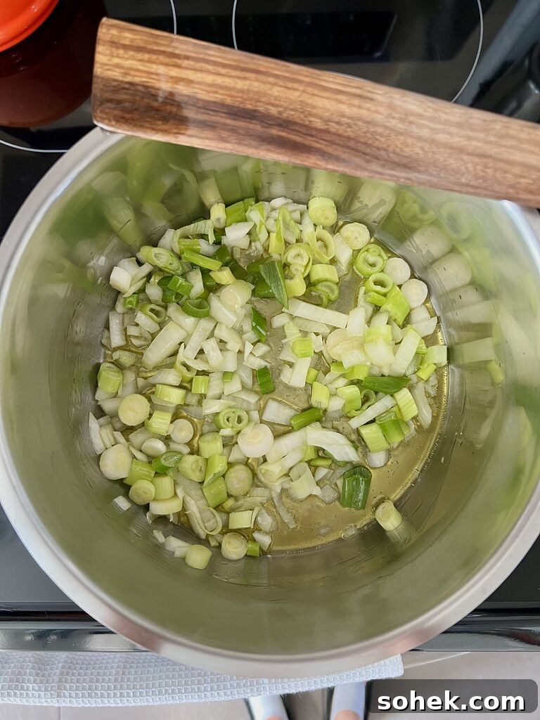 Cooking of the spinach and potato stew.