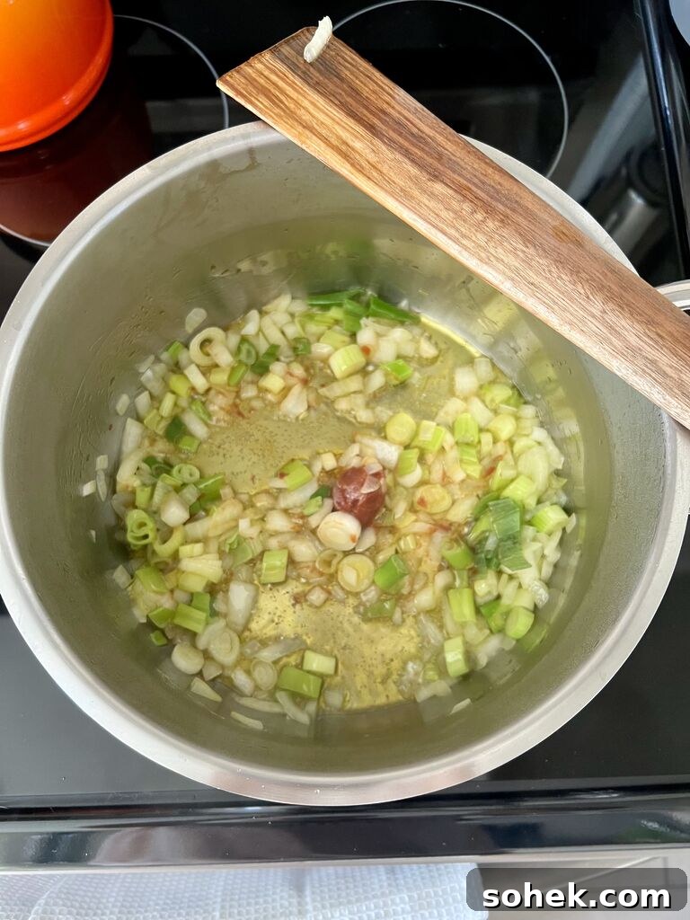 Cooking of the spinach and potato stew.
