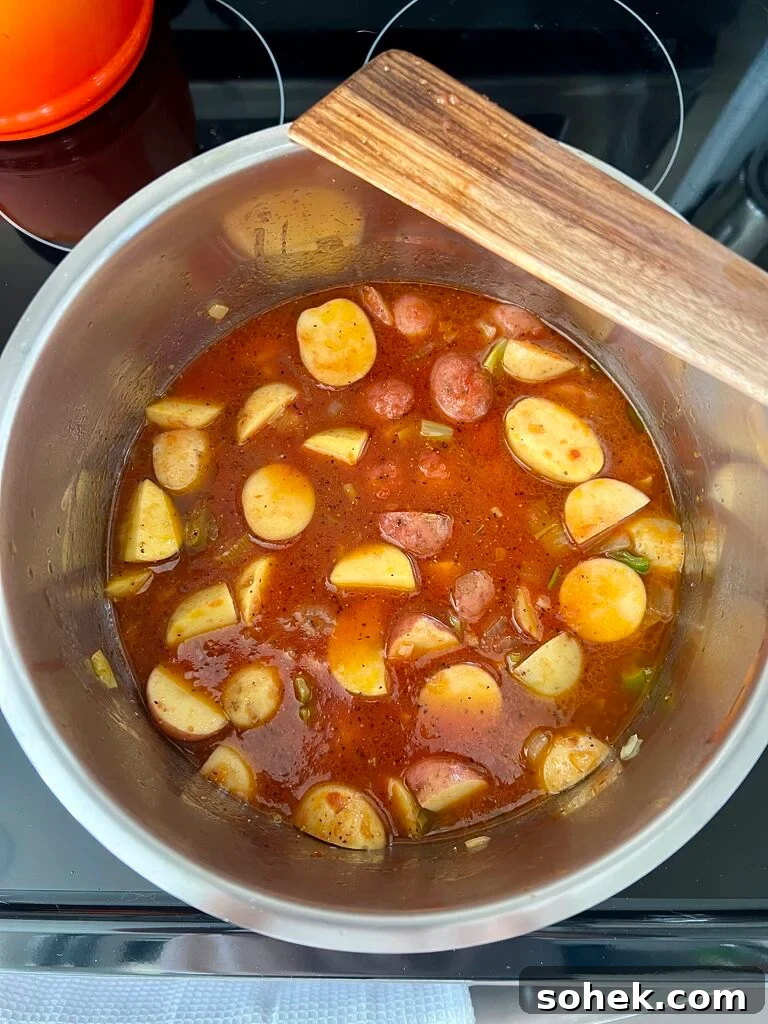 Cooking of the spinach and potato stew.