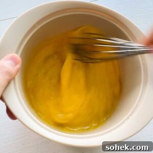 Whisk eggs in bowl