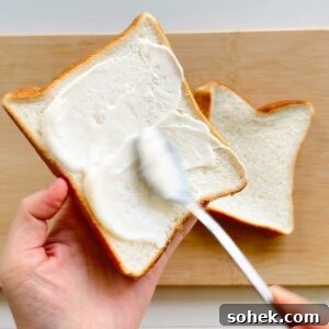 Spread mayo on bread